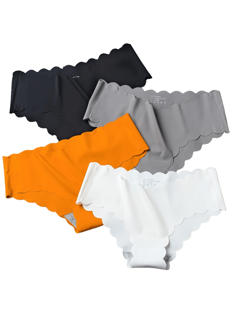 Solid color low waist ruffle stretch briefs in black, grey, orange, and white. Seamless underwear with a feminine touch.